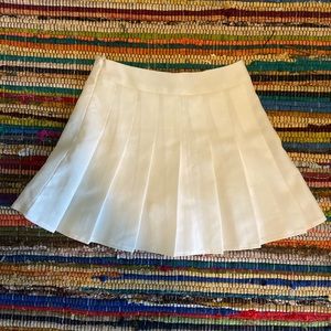 white pleated skirt